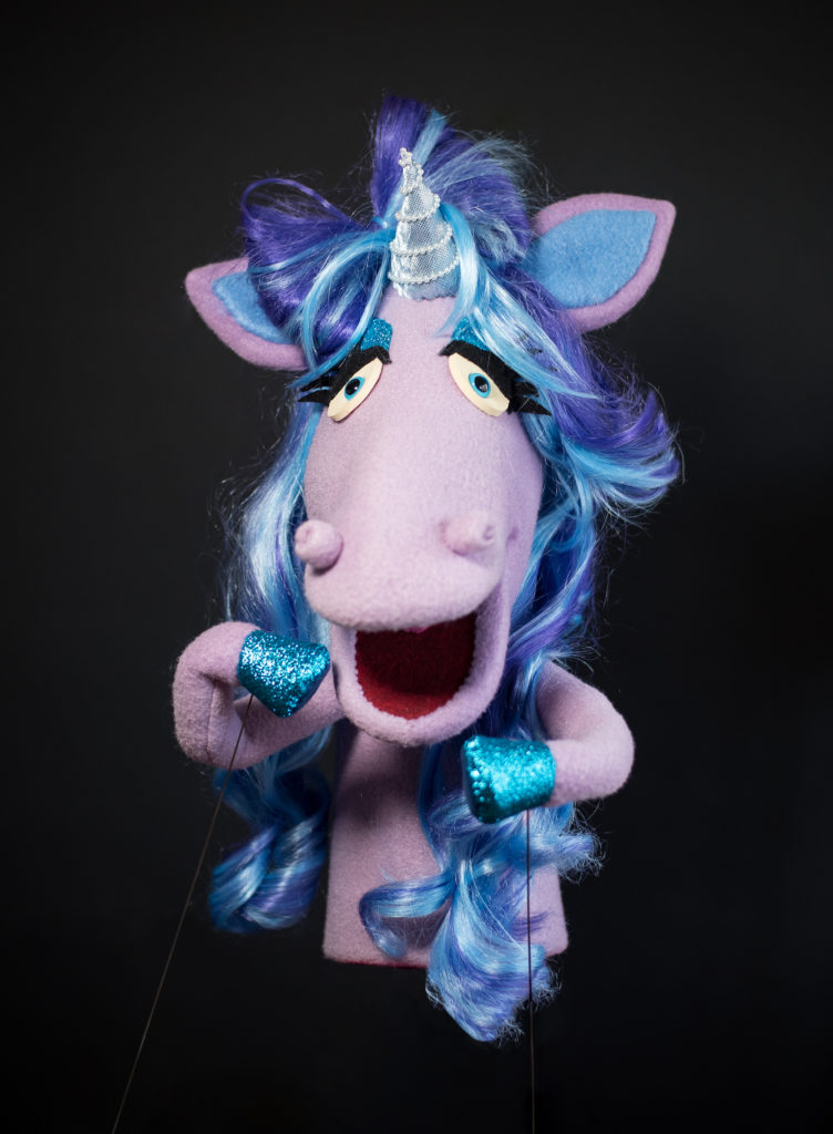 Light purple unicorn puppet with blue and purple long hair and sparkly blue hooves and horn.